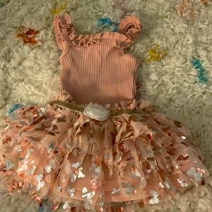 Pink body suit with tutu